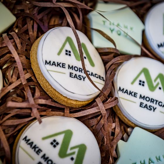 Branded thank-you biscuits sent to clients on completion