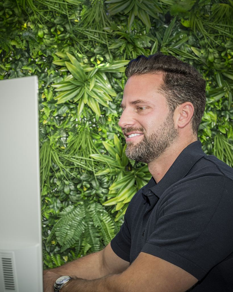 Tom Williams, founder of Make Mortgages Easy, at his desk
